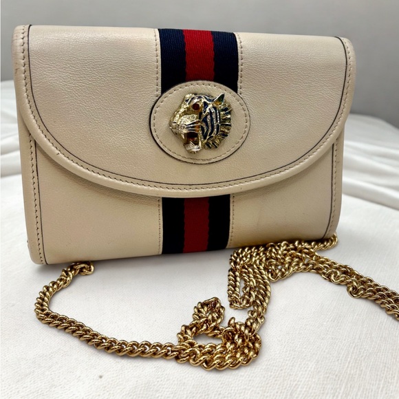 Gucci Handbags - Gucci Rajah clutch with chain